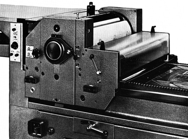 FAG Swiss Proof 52 equipped with a power driven cyinder with stepless speed adjustement MVA. From a Swiss Proof Catalog from the early 1970ies.