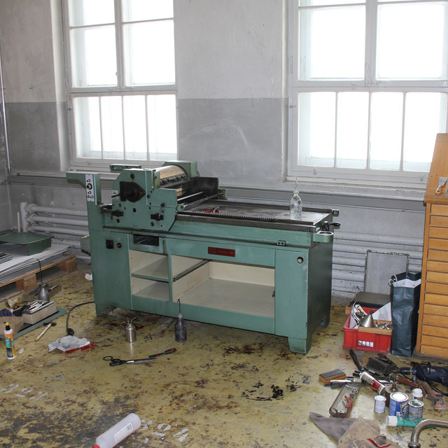 The press during cleaning action.